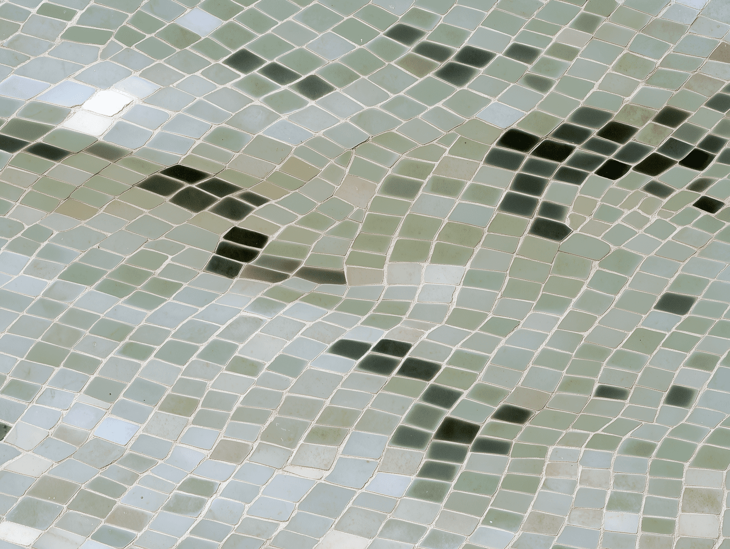 A dense mosaic of green and blue fragments seen up close