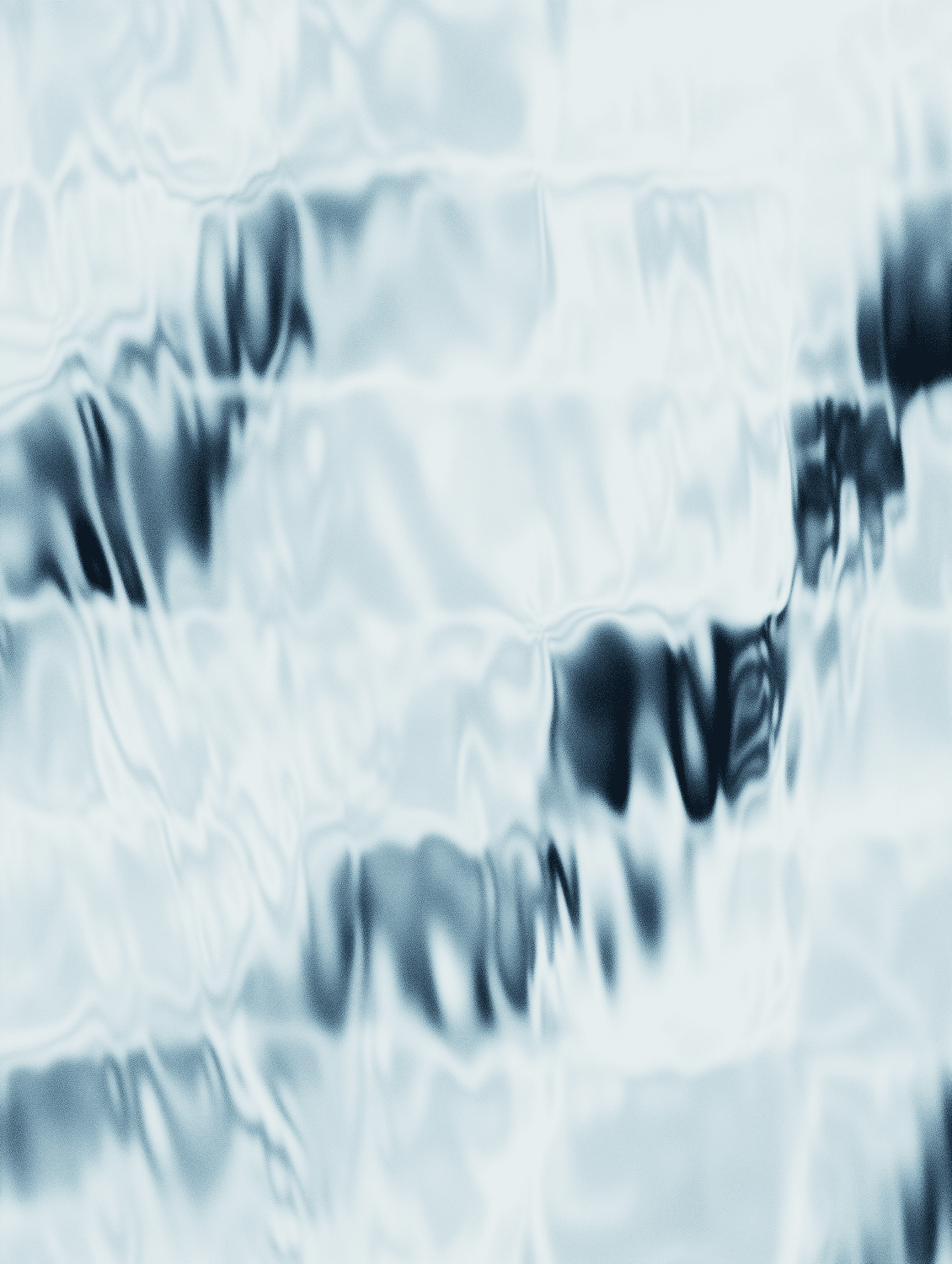 Cool blue ripples moving across a softly focused water surface